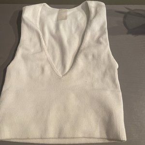 White tank top low cut ribbed.